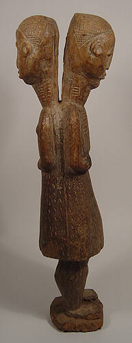 Double-headed Standing Figure