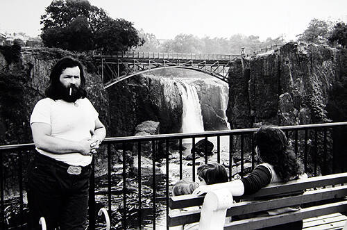 Family in Front of Waterfall