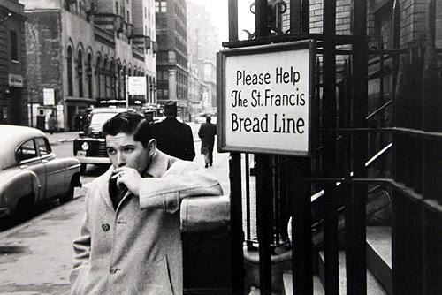 Man Smoking Cigarette Outside St. Frances Bread Line, New York City